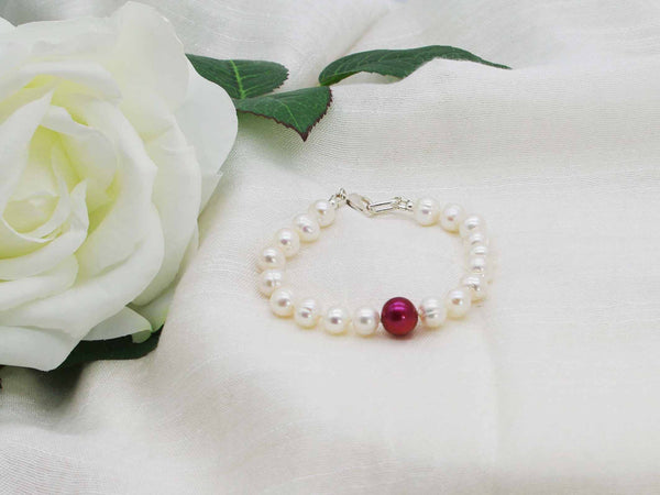 Mulberry Crush white pearl hand knotted bracelet with feature mulberry pearl and sterling silver lobster clasp from Jewellery by Linda
