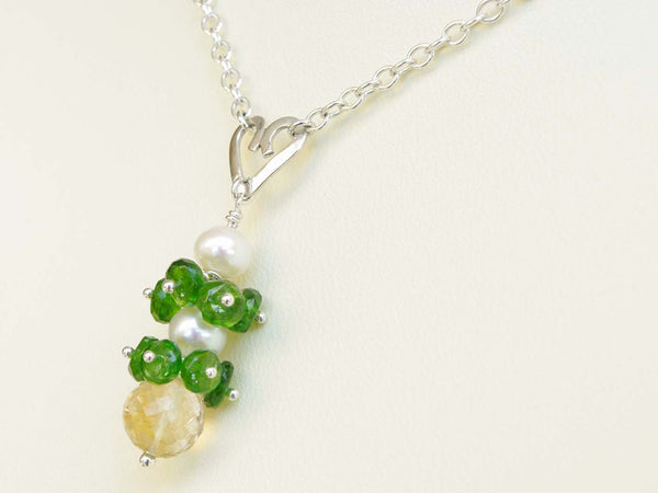 Chloe necklace. Russian diopsides, with a white freshwater cultured pearl and citrine. Suspended from a polished sterling silver handmade heart on a sterling silver chain. Sweet Heart Collection. 47cm chain. 3.5cm pendant