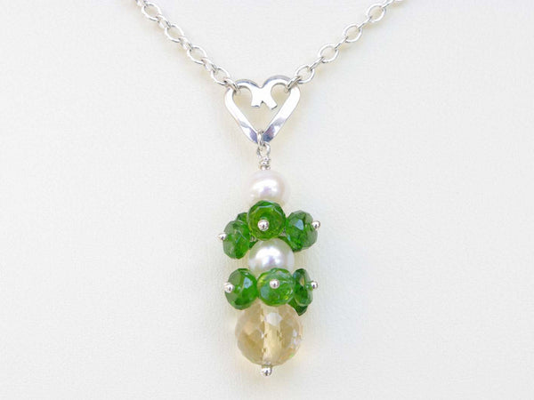 Chloe necklace. Russian diopsides, with a white freshwater cultured pearl and citrine. Suspended from a polished sterling silver handmade heart on a sterling silver chain. Sweet Heart Collection. Jewellery by Linda