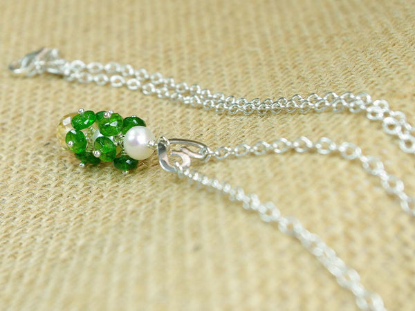 Chloe necklace. Russian diopsides, with a white freshwater cultured pearl and citrine. Suspended from a polished sterling silver handmade heart on a sterling silver chain. Sweet Heart Collection at Jewellery by Linda. 47cm chain. 3.5cm pendant