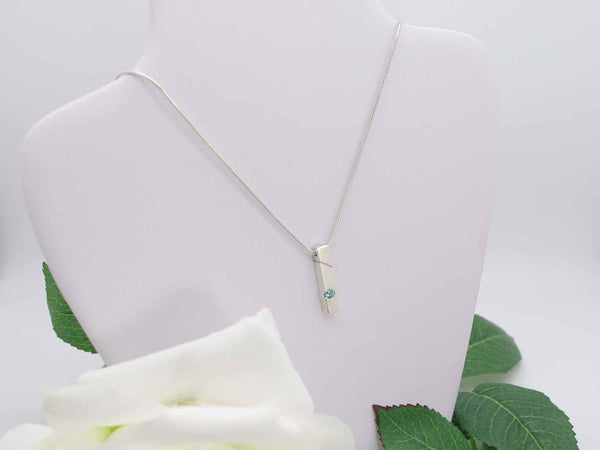 Swiss Blue Topaz Cutout Simplicity Vertical Bar Pendant on bust Jewellery by Linda