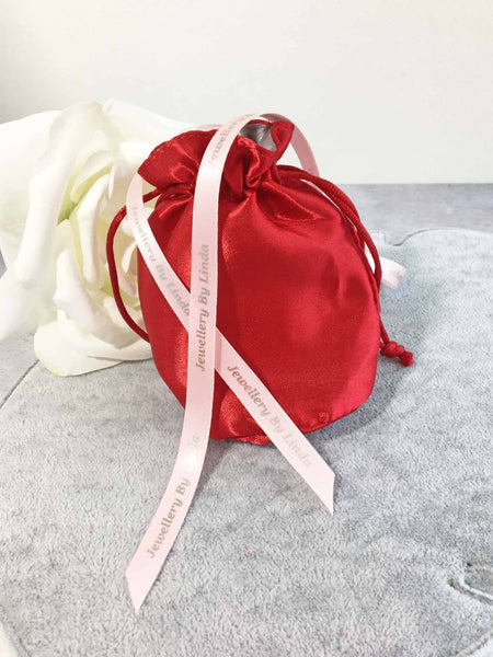 Jewellery by Linda Satin and ribbon gift wrapping