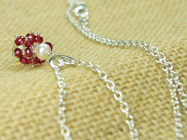 Roslyn necklace. Red spinel with a white freshwater cultured pearl and citrine. Suspended from a polished sterling silver handmade heart on a sterling silver chain. Sweet Heart Collection. 46cm chain. 3.5cm pendant
