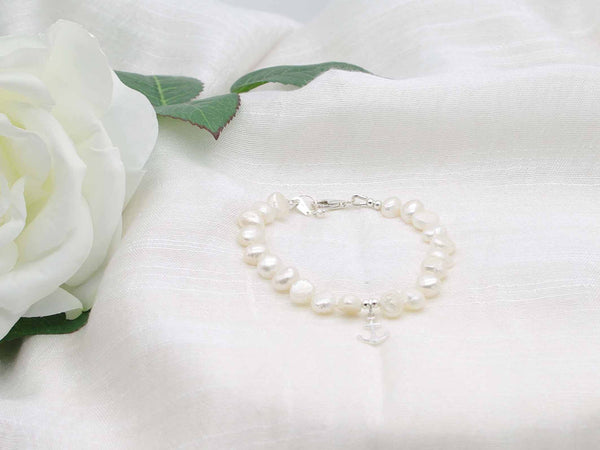 Baroque white pearl bracelet with sterling silver charm from Jewellery by Linda