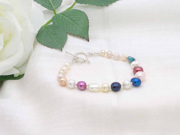 Multitude colourful hand knotted pearl bracelet with silver toggle clasp from Jewellery by Linda