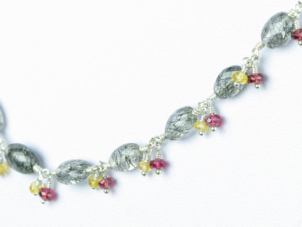 Elegance necklace. Exceptional rutile quartz, yellow sapphire, red spinel, sterling silver.