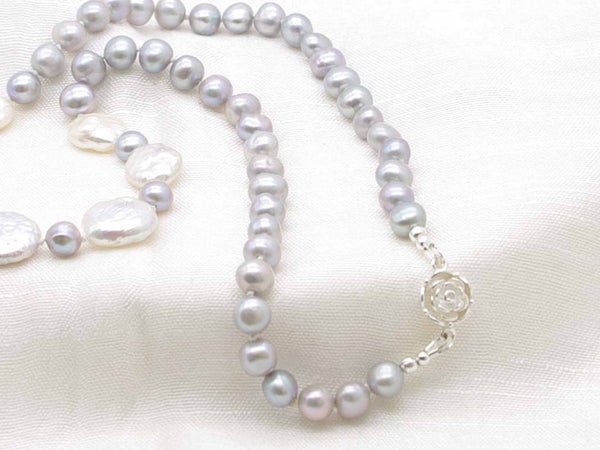 Distinctive hand knotted silver grey pearl necklace with striking iridescent silver coin pearls from Jewellery by Linda with feature sterling silver rose clasp