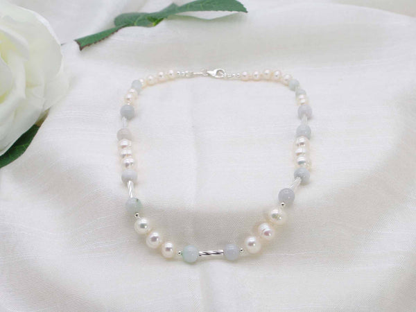 Luxury opulent strand of hand knotted pearls with jadeite and sterling silver tubes. From Jewellery by Linda. A modern twist on a classic design